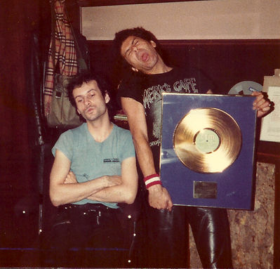 Charlie and Nicky with their Crash Course gold disc